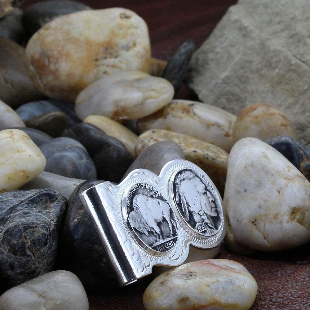 Montana Silversmiths Buffalo Indian Nickel Scalloped Money Clip Against Stones Background