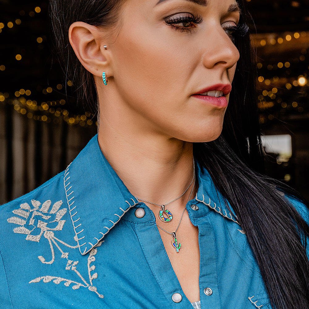 
                  
                    Woman Wearing Montana Silversmiths Women's Studded In Turquoise Mini Hoop Earrings
                  
                