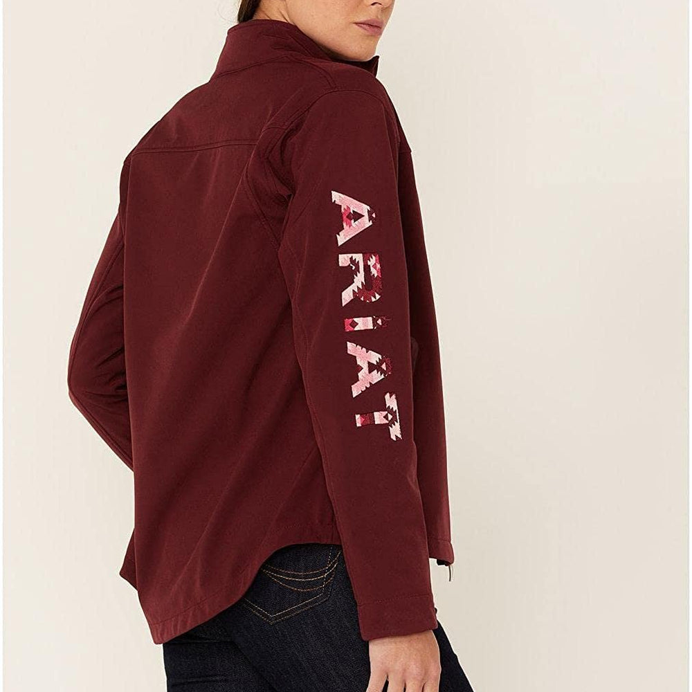 
                  
                    Woman Wearing Ariat Women's New Team Softshell Jacket in Zinfandel/Carmen Geo
                  
                