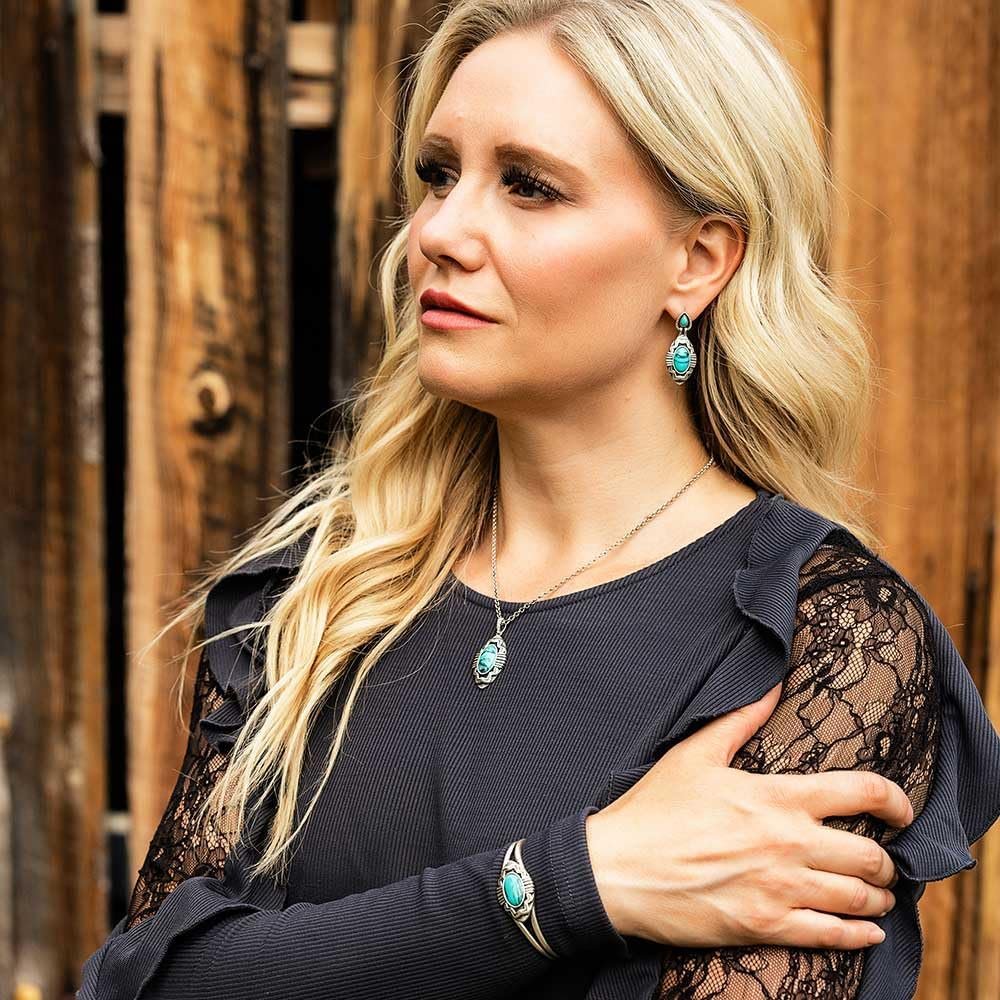 
                  
                    Woman Wearing Montana Silversmiths Blue Mesa Turquoise Earrings
                  
                